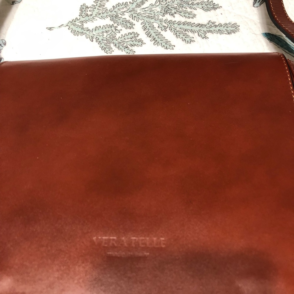 Never used.  Bag purchased in Italy..  Beautiful bag.